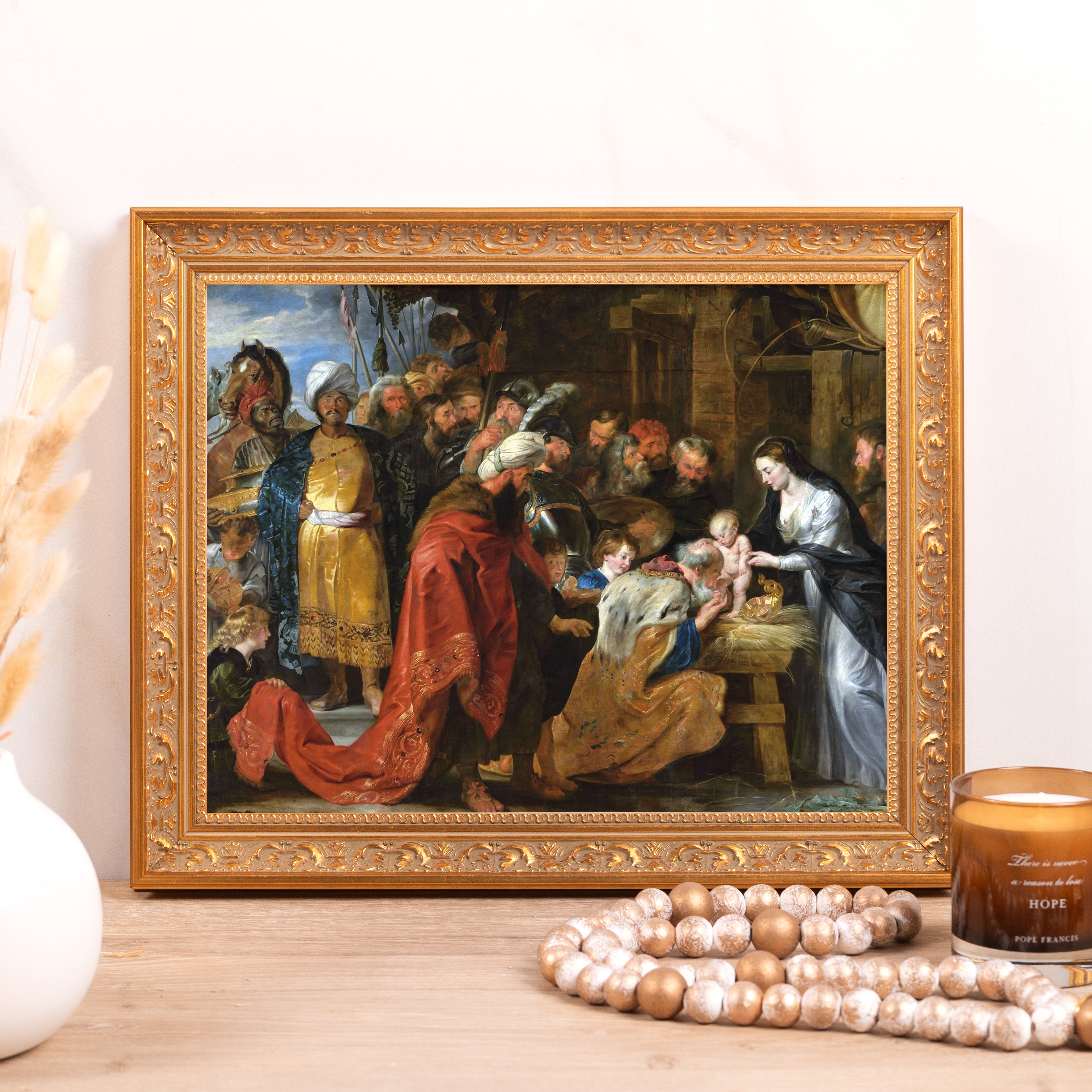 Framed "Adoration of the Magi" print with gold ornate frame, colorful Renaissance style.