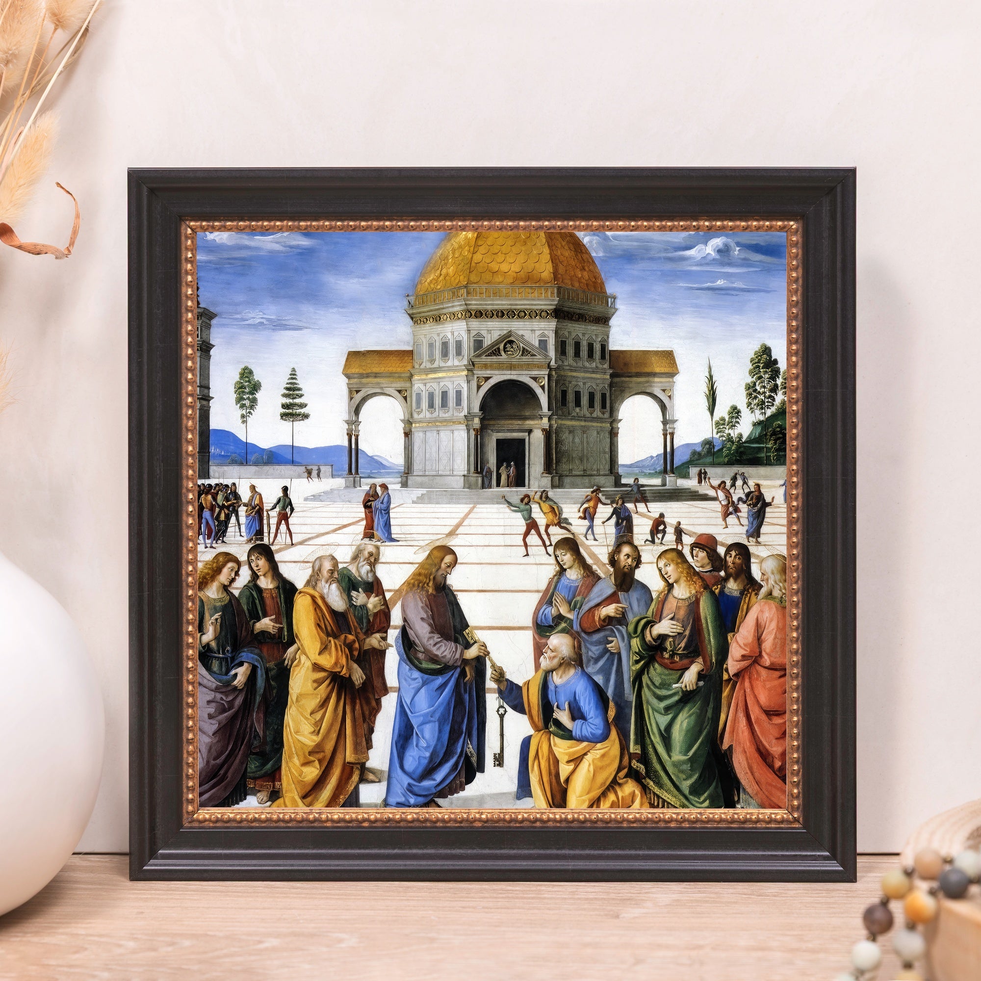 Framed Painting depicts a biblical scene with a black frame and tan, copper, and gold colors.