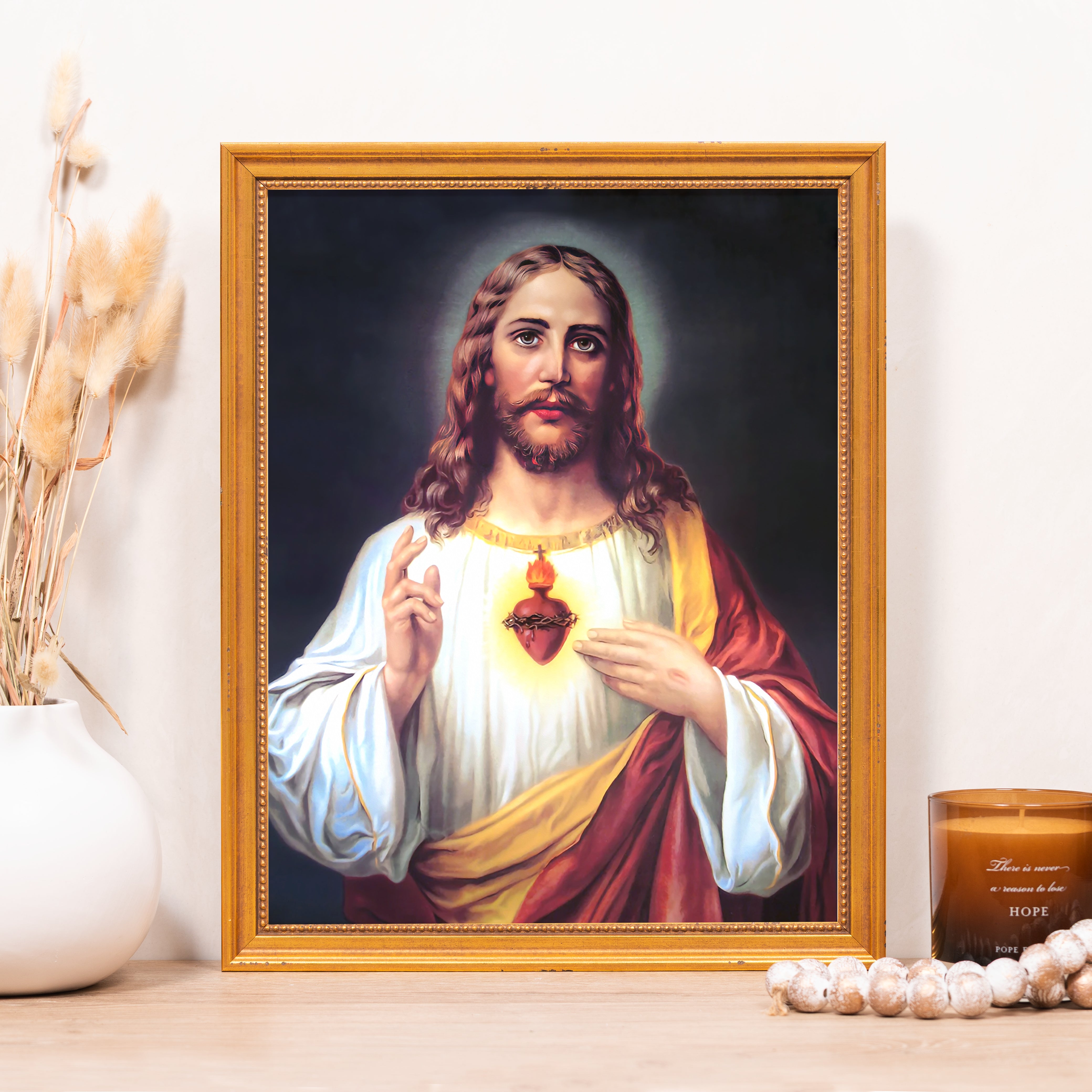 Framed print of Jesus with golden frame.