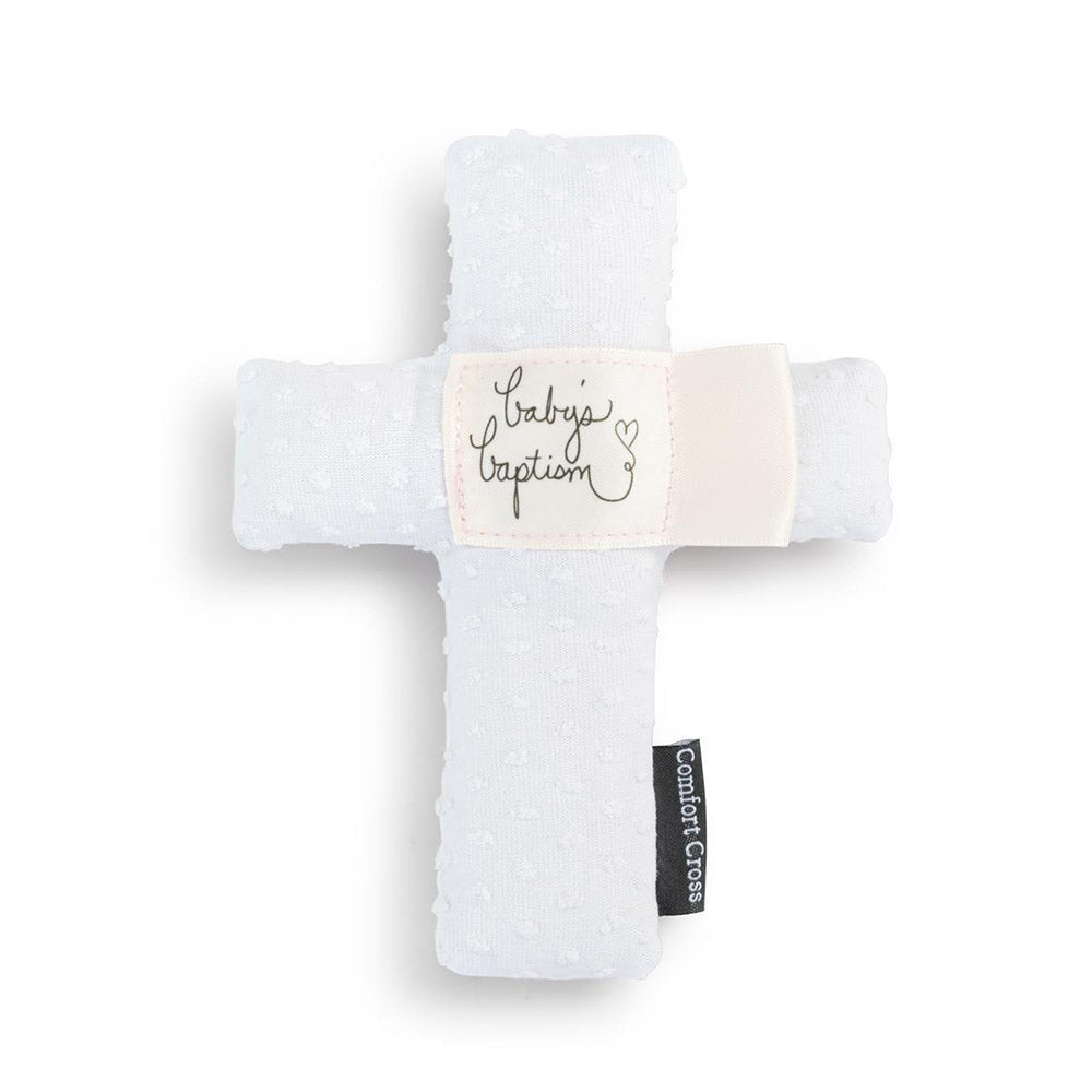 White, plush baptism comfort cross with embroidered label and brand tag.