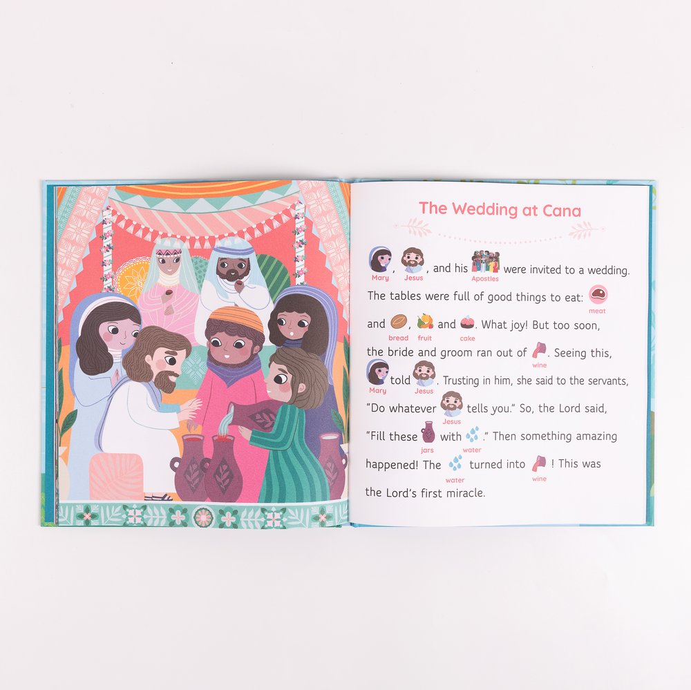 Open children's book about "The Wedding at Cana" with colorful illustrations of Jesus and Mary turning water to wine.