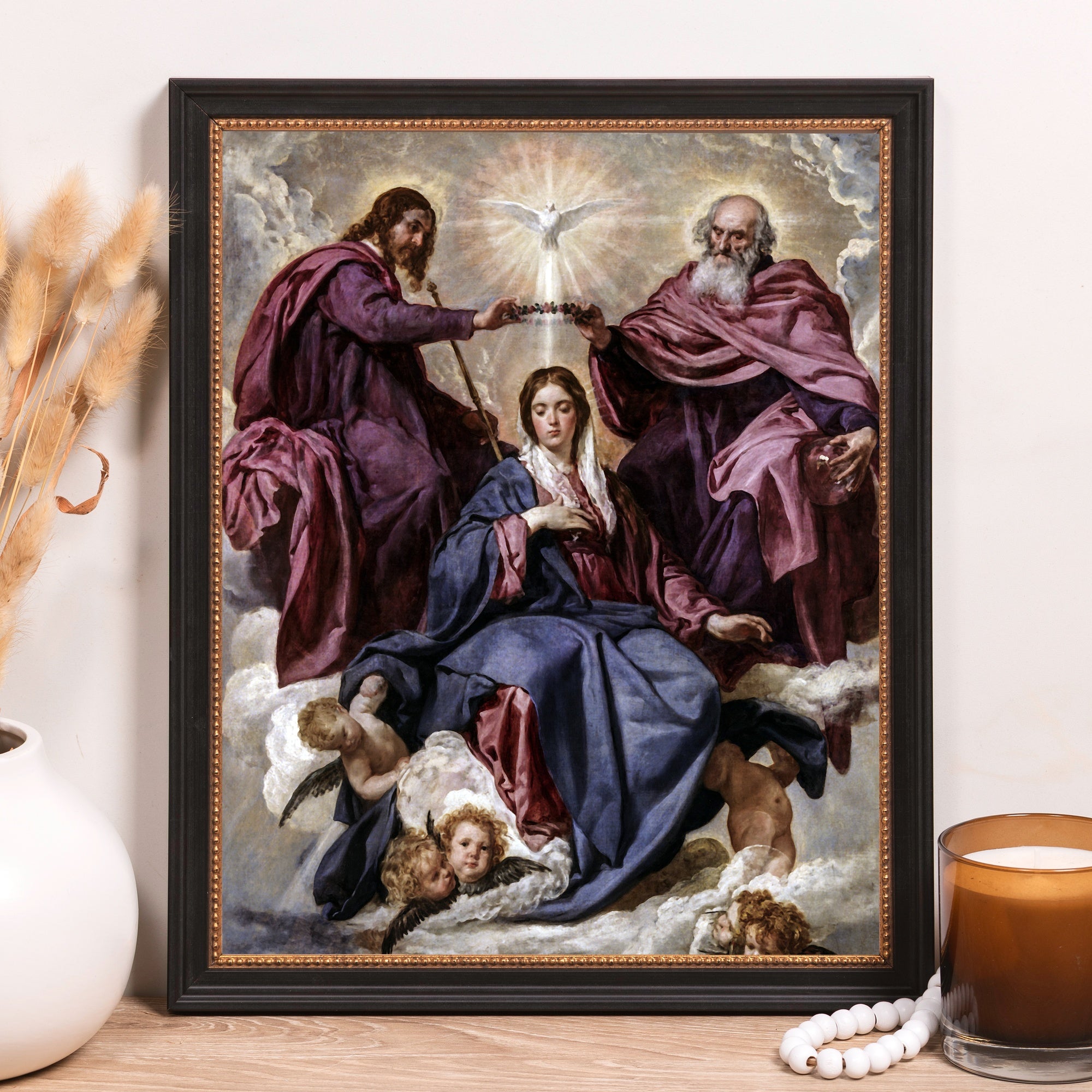 Framed "Coronation of the Virgin" art print with black frame and Renaissance style.