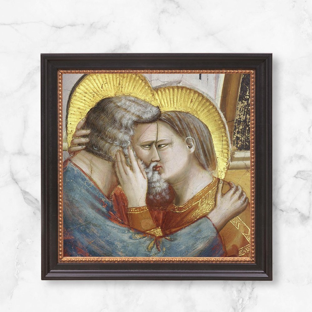 Framed painting depicts a tender kiss between figures with golden halos in a classical style.