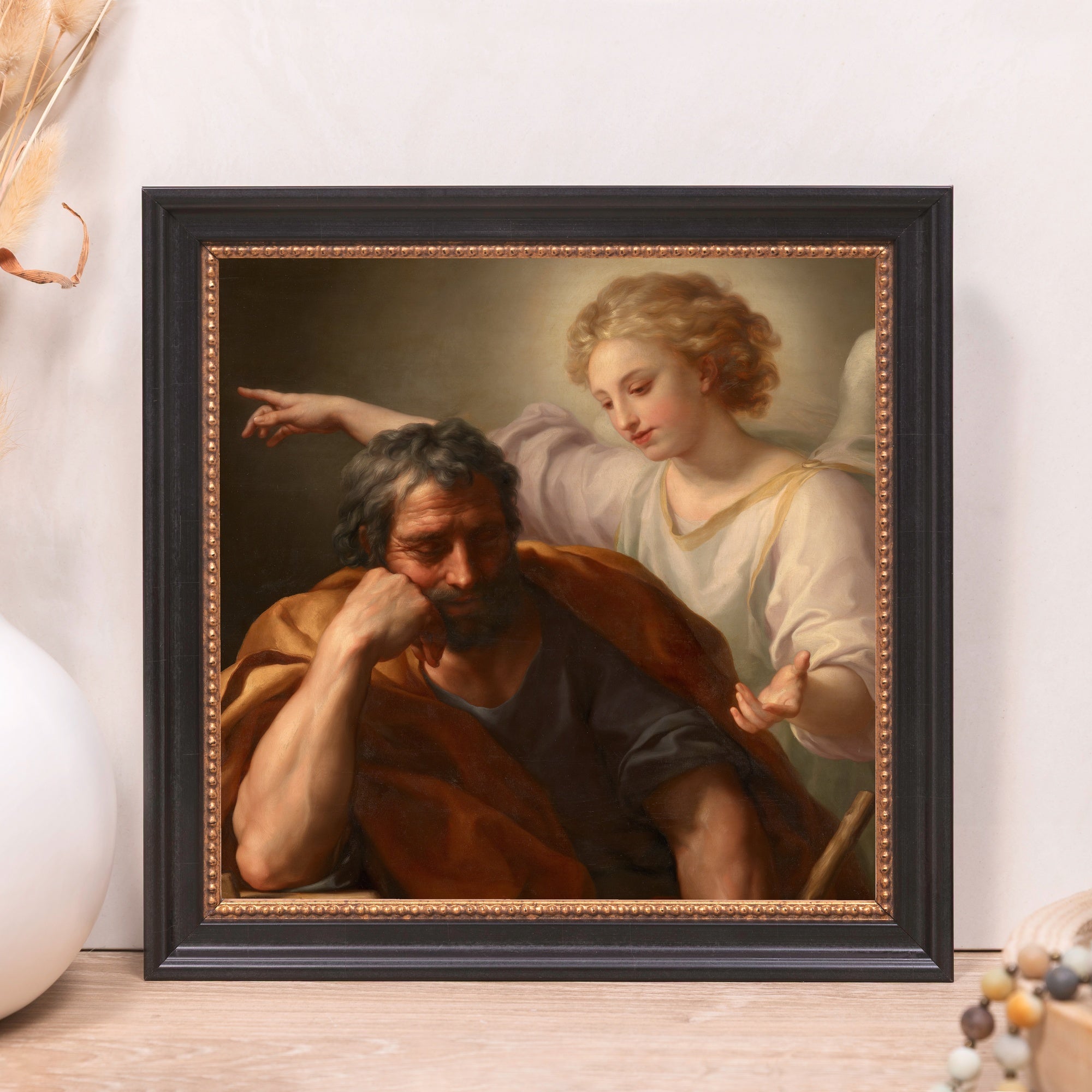 Framed Print depicting Saint Joseph being visited by an angel in classical oil painting style.