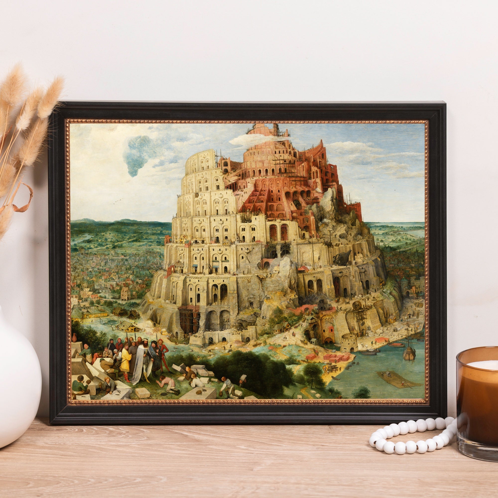Framed Tower of Babel print with brown, black, and neutral tones in a classic style.