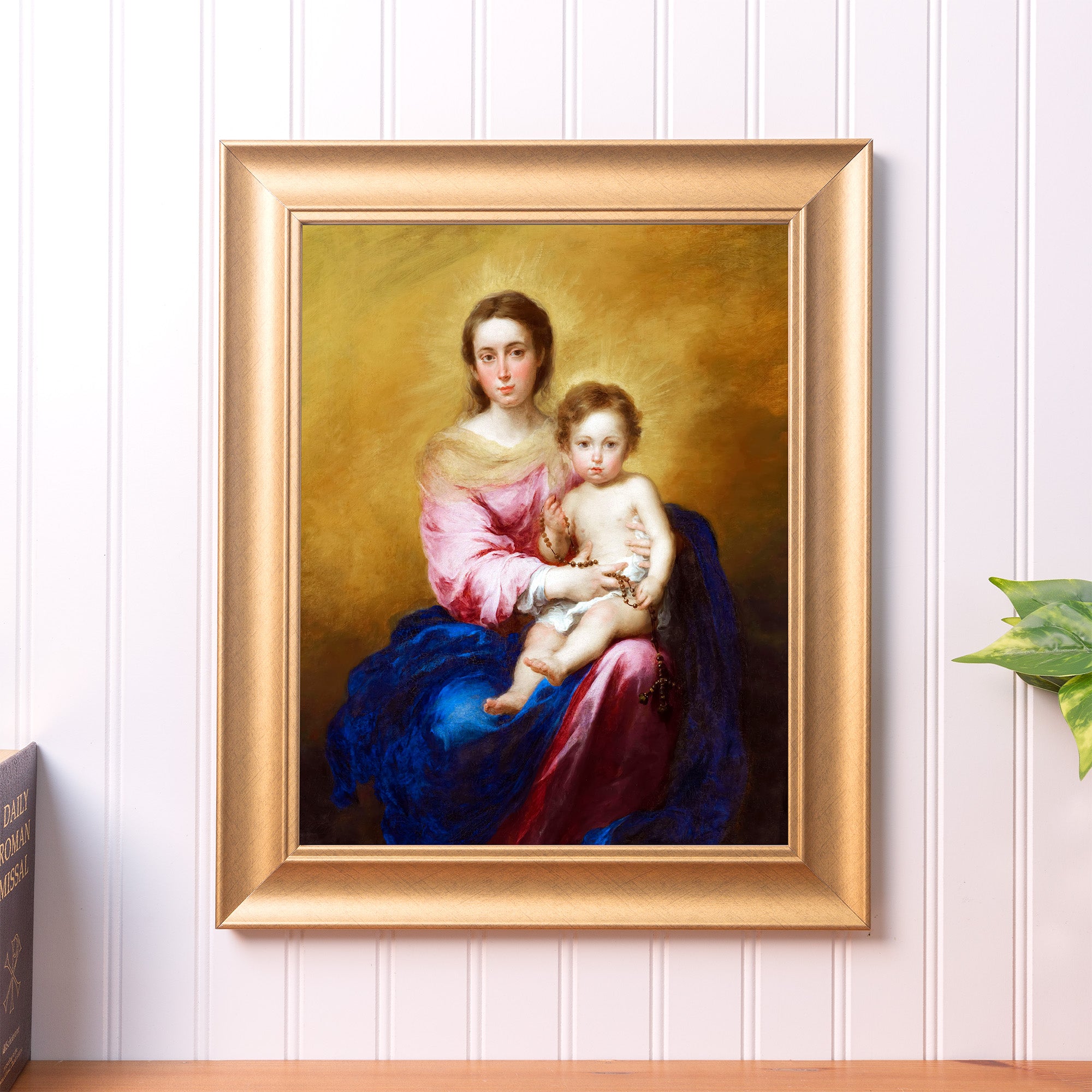 Framed "Madonna and Child" print. A traditional religious oil painting in a gold frame.