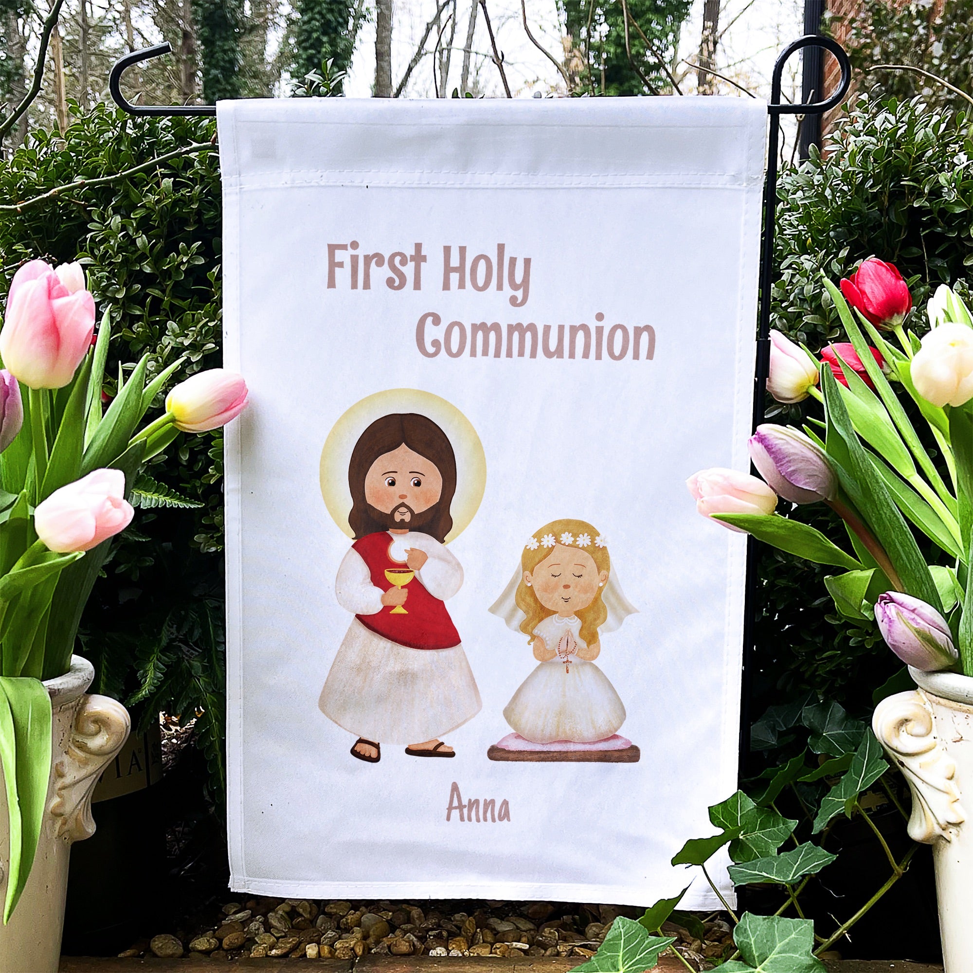 First communion garden flag with Jesus and child graphic on a white background.