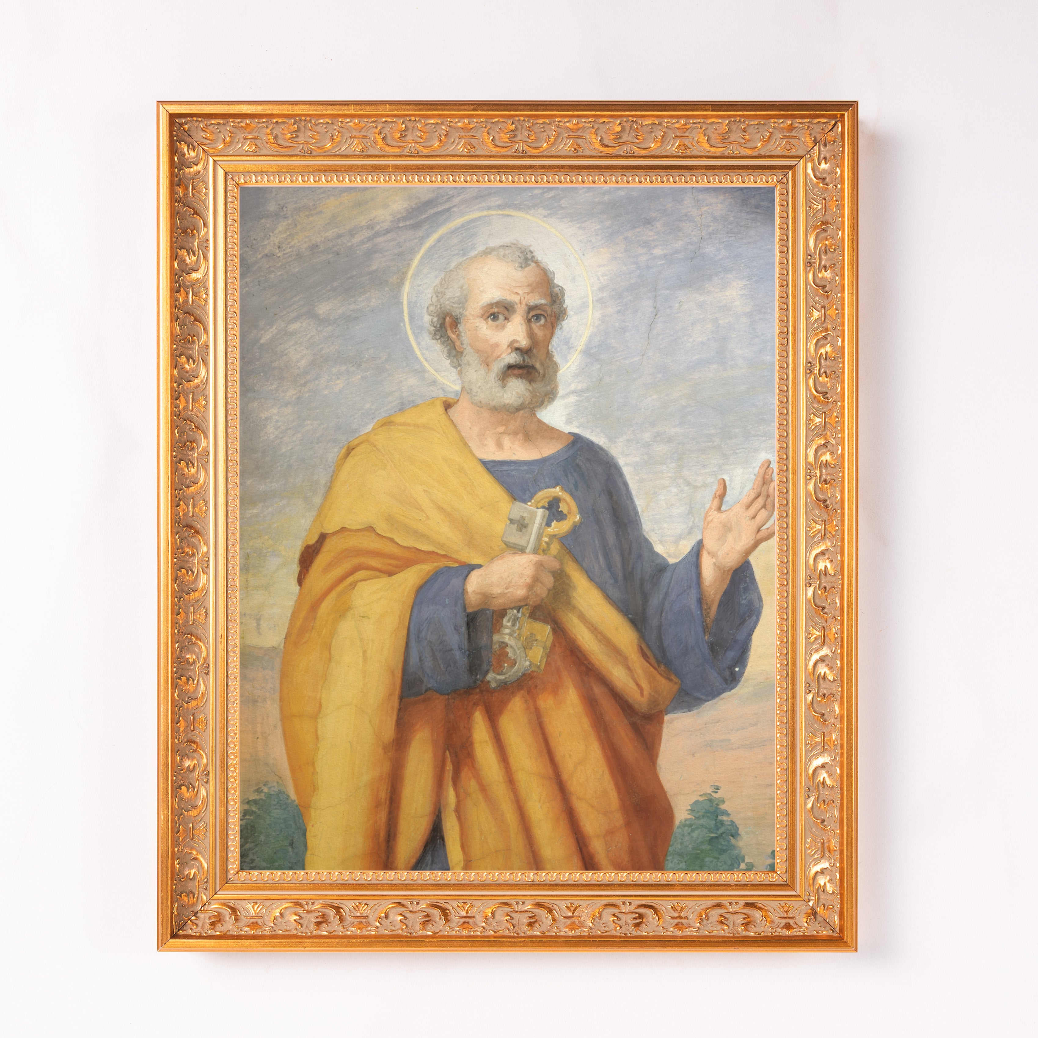 Framed painting of a man with keys, in a gold frame.