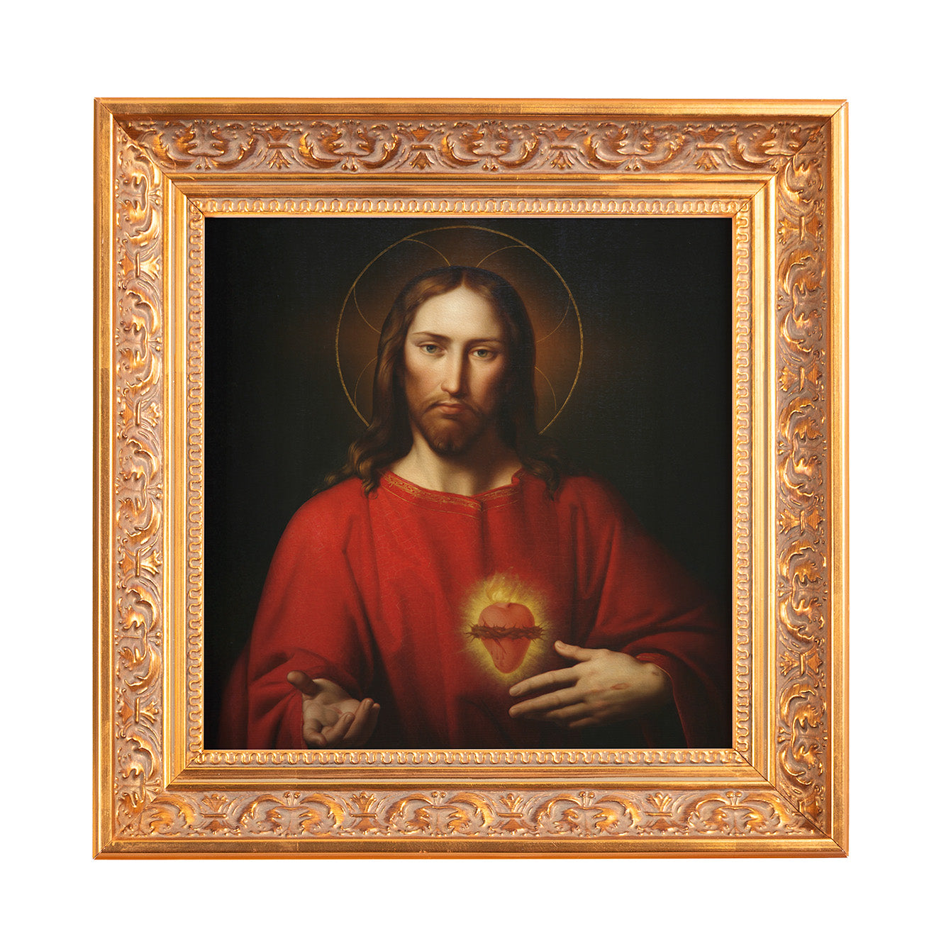Framed painting of Jesus with Sacred Heart, in red robe, with gold ornate frame.