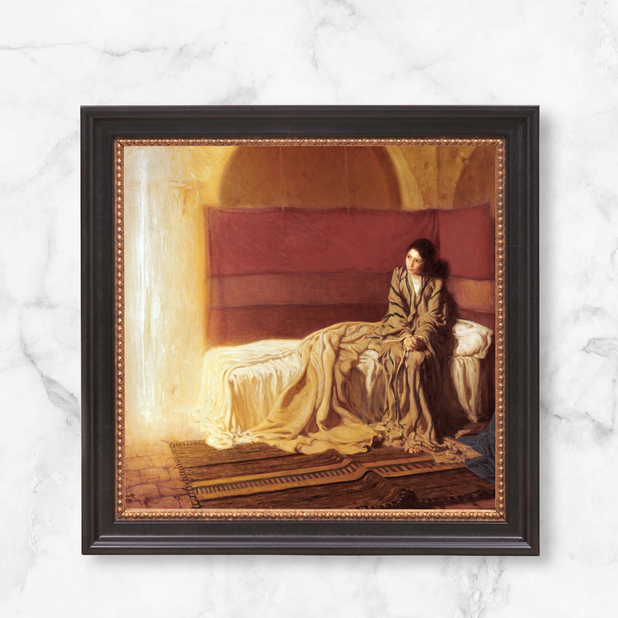 Framed print of "The Annunciation" oil painting, dark wood frame with gold beaded accent.