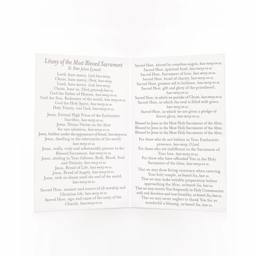 White, folded paper listing the Litany of the Most Blessed Sacrament, printed in black ink, for use in Catholic prayer.
