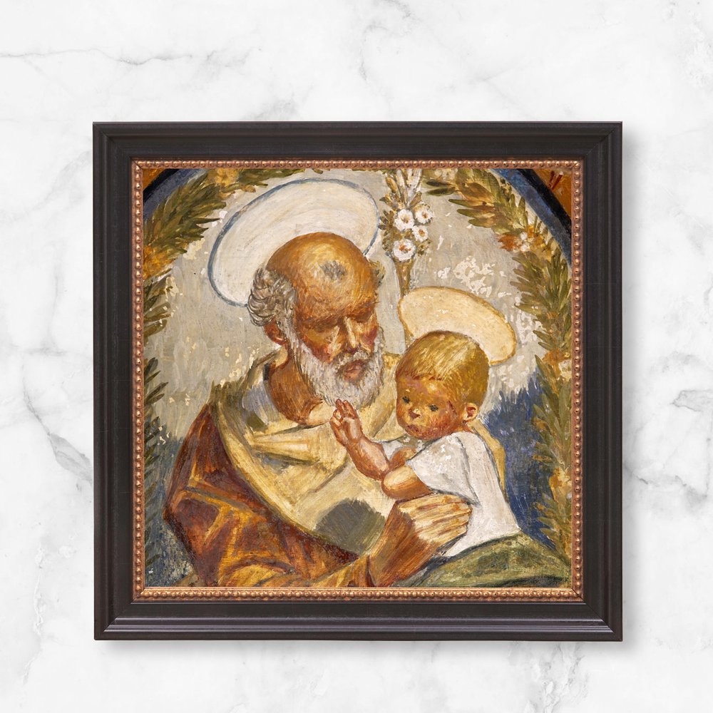 Framed, textured art print of St. Joseph holding baby Jesus, in a dark brown frame.