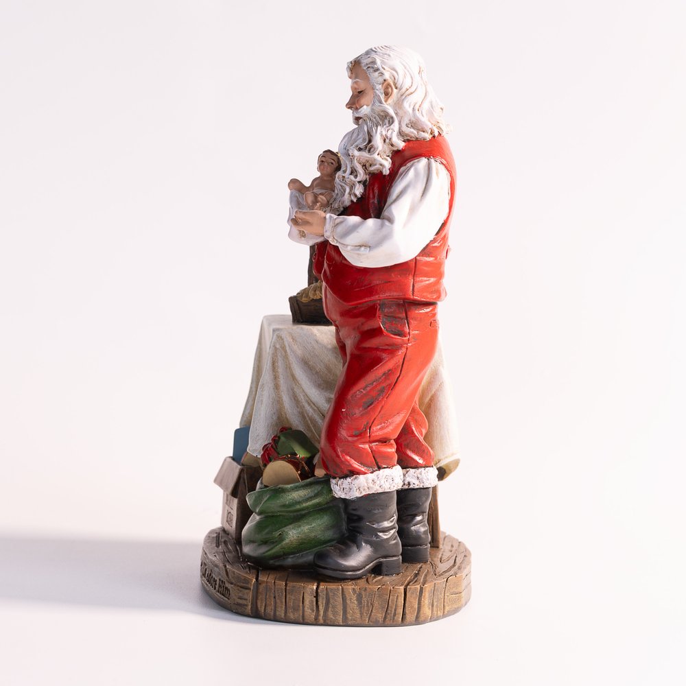 Adoring Santa Figurine