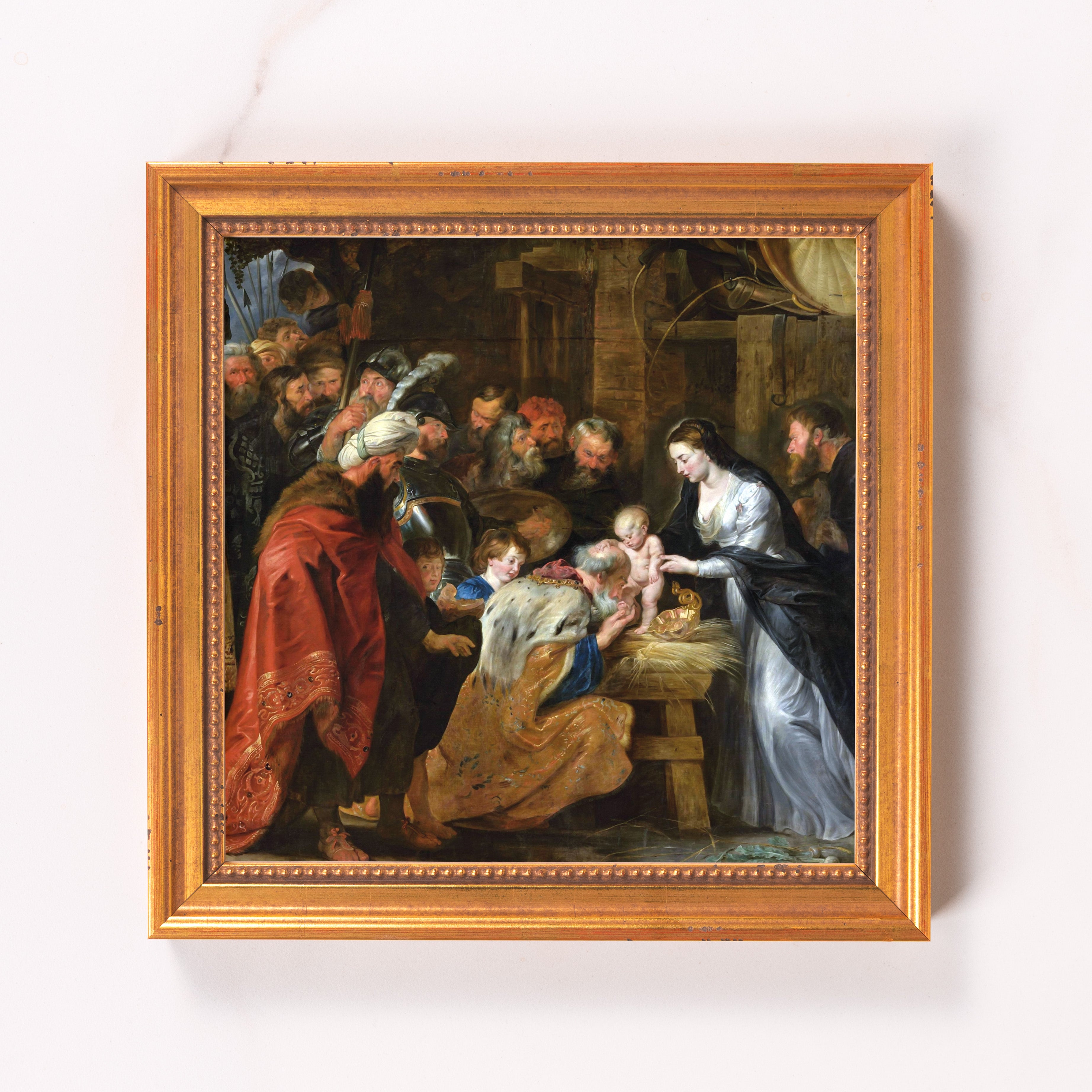 Framed oil painting depicting the Adoration of the Magi in a golden frame.