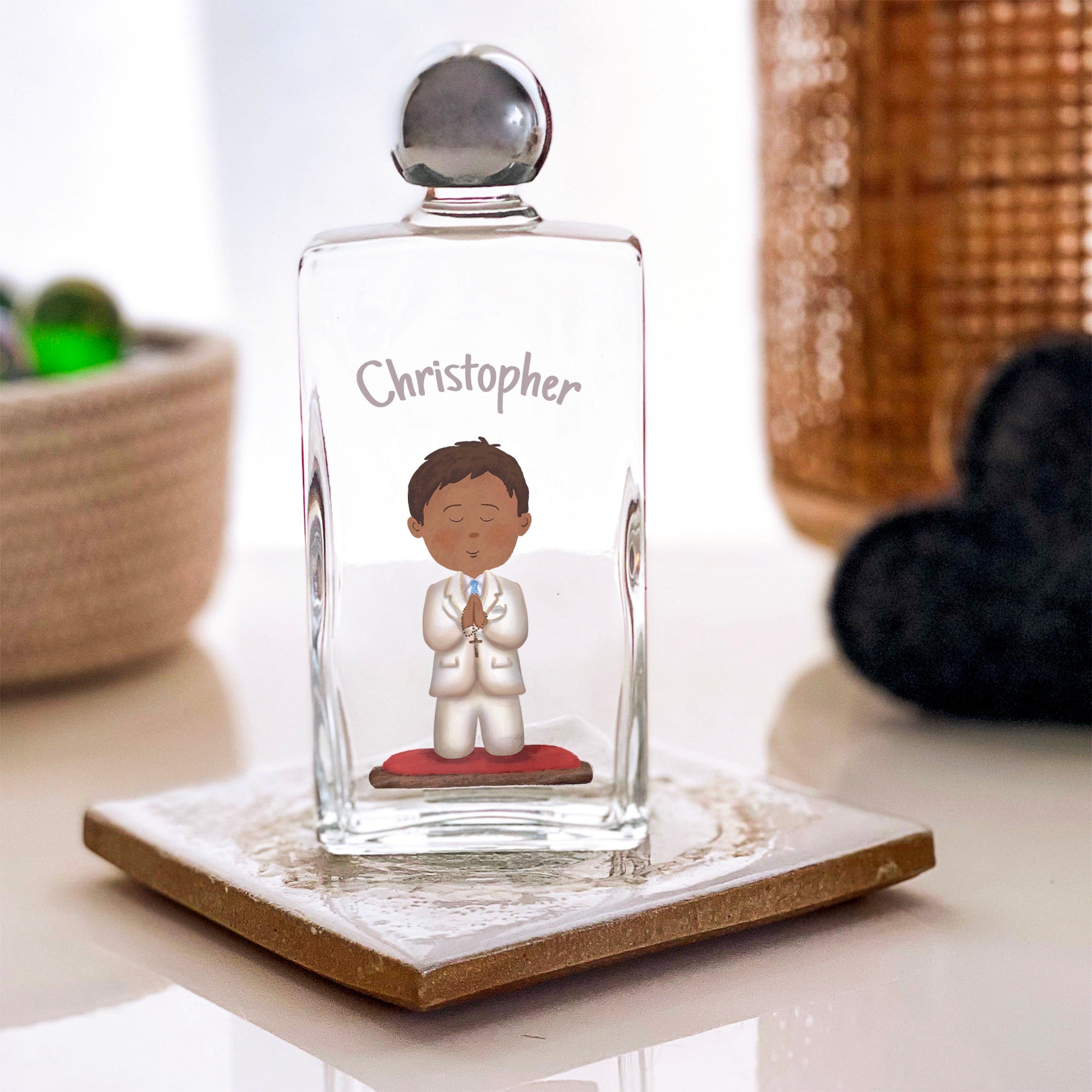 Personalized, clear glass holy water bottle with silver top, printed with boy graphic and name.