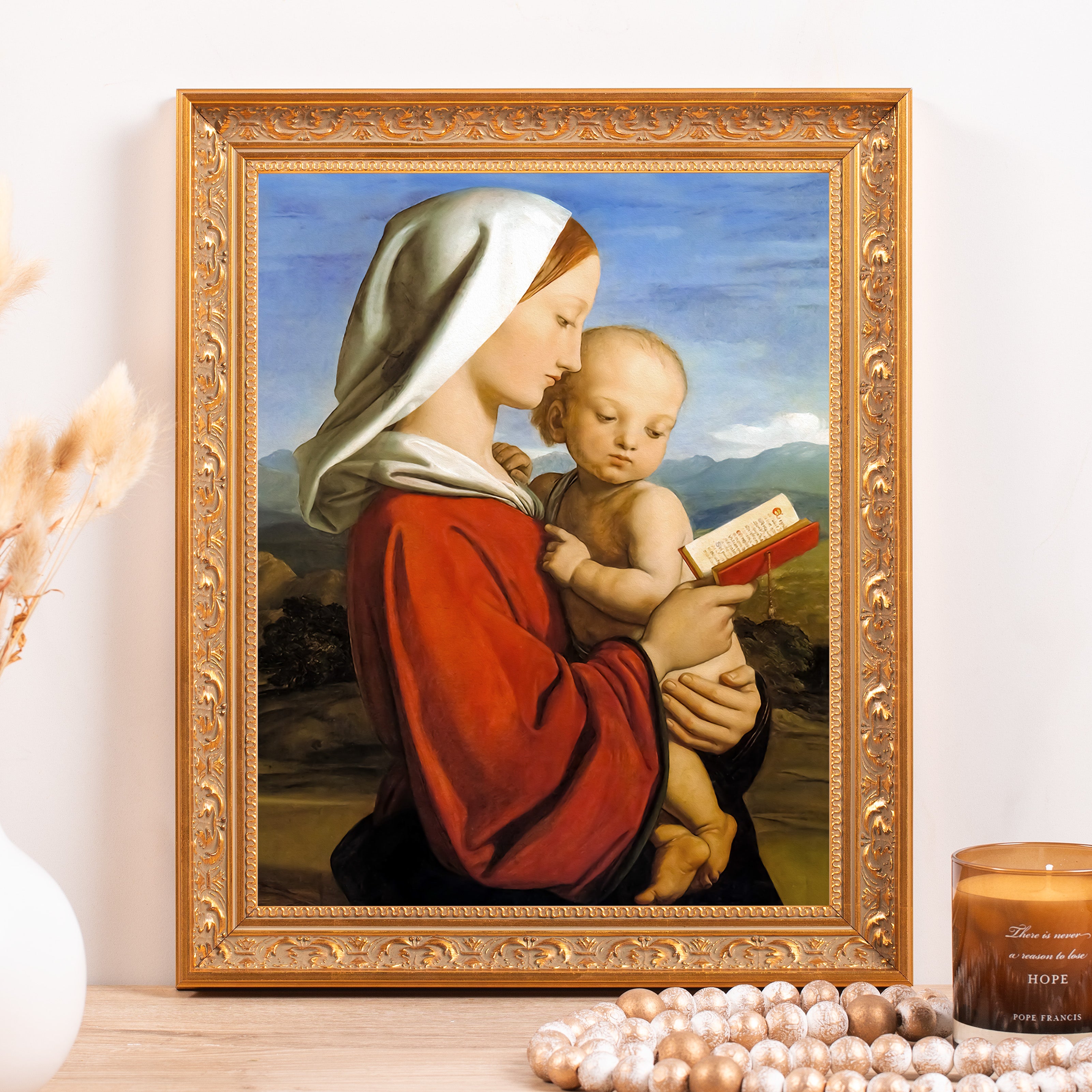 Framed Painting of mother and child in a decorative gold frame for home decor, red, white, and blue.