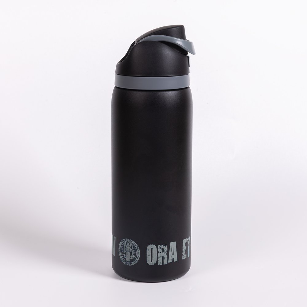 Black, cylindrical stainless steel water bottle with gray accents and "Ora et Labora" text.