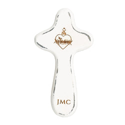 White, distressed, wood pocket cross with a heart icon and the initials "JMC" on the front.