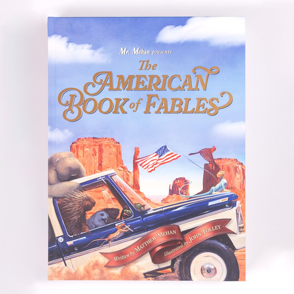 Children's fable book. "The American Book of Fables" cover features animals driving a truck in a desert landscape.
