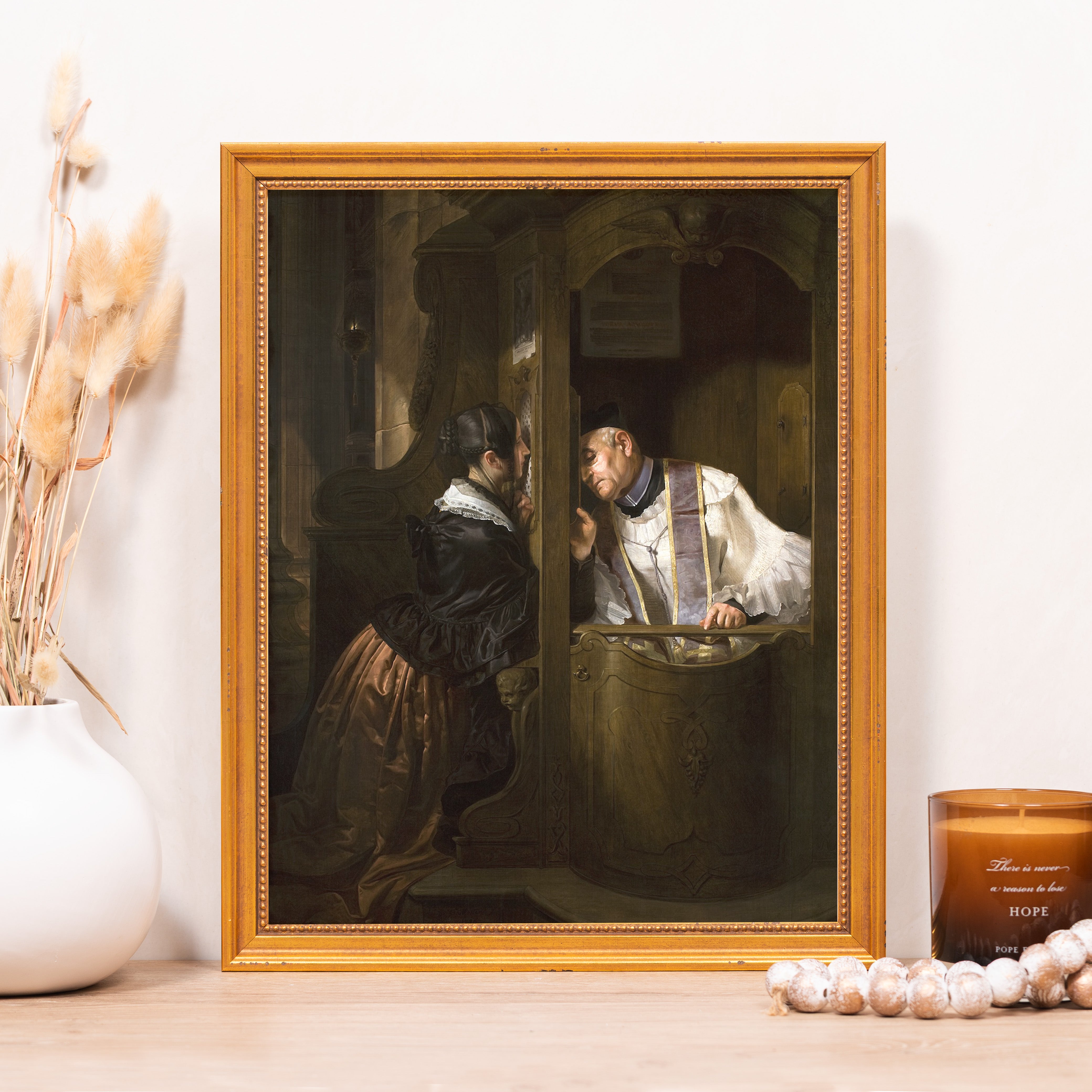 Framed painting depicting a woman confessing to a priest, featuring a golden frame.