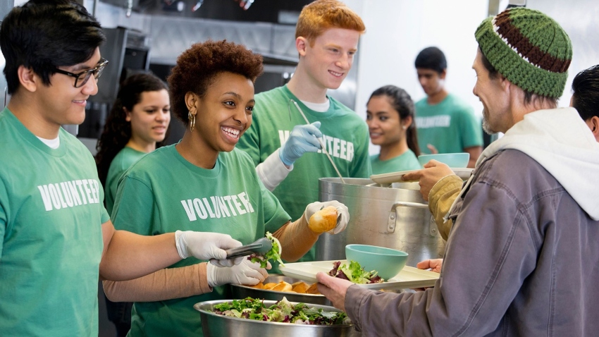 People Serving at a Soup Kitchen - Photo Credit barclays.com